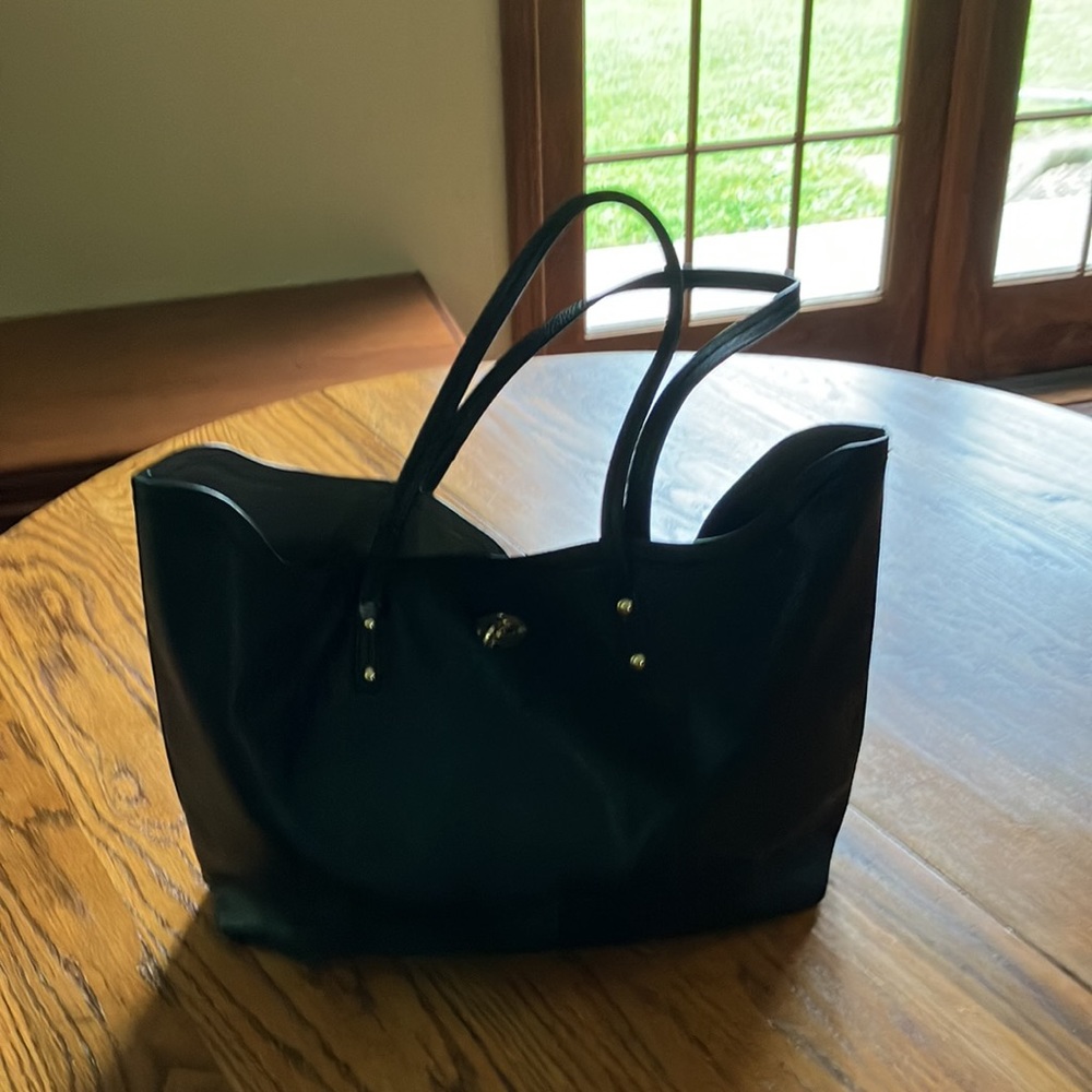BCBG PARIS BLACK & GOLD TOTE WITH TURN BUTTON FASTENER WITH TAUPE LINING - Picture 2 of 9